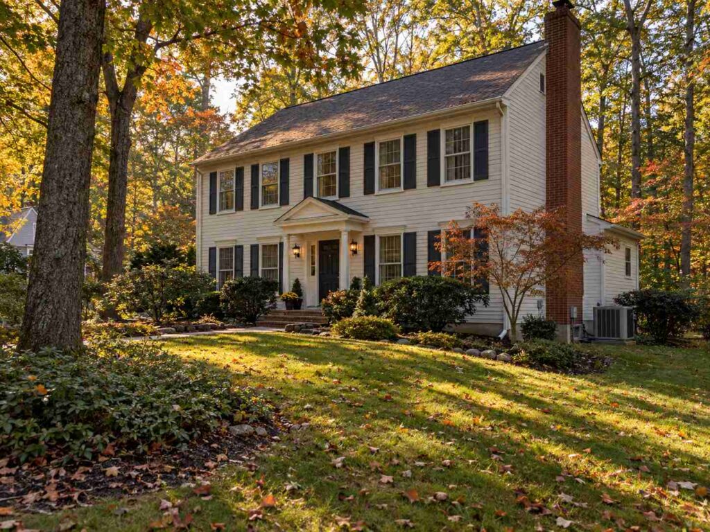Two-story colonial home in Jackson, NJ with central air condenser